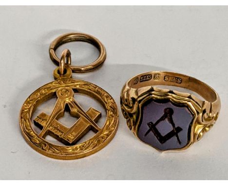 A 9ct gold Masonic pendant, 5.9g, together with a yellow metal Masonic ring. 3gLocation: 