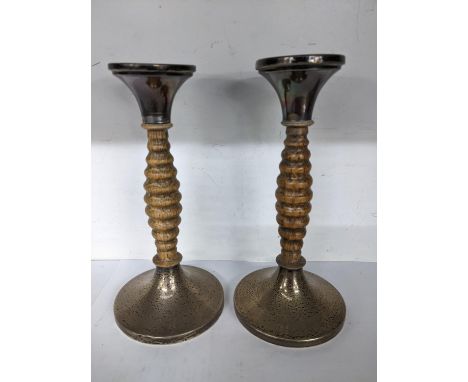 A pair of Arts & Crafts silver candlesticks with treen turned columns, 17.5hLocation: 