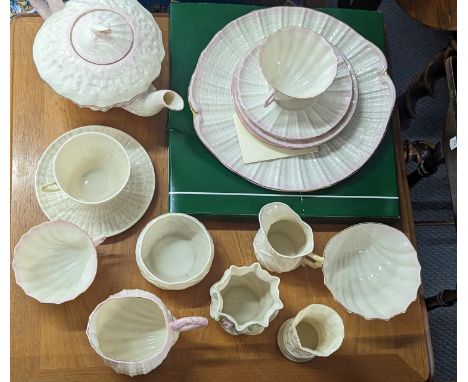 A collection of Belleek items to include Shell Design teapot, cups and saucers and othersLocation: 