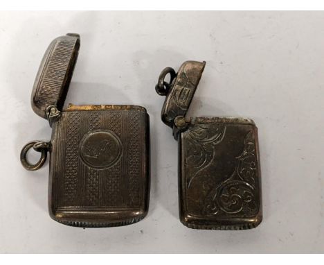 Two early 20th century silver vesta cases one with engine turned decoration and initials, hallmarked Chester 1904, the other 