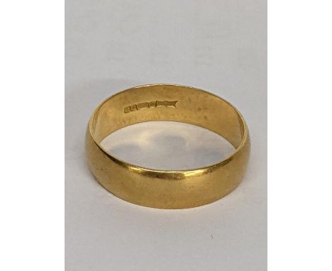 A 18ct gold wedding ring, 6.7gLocation: 