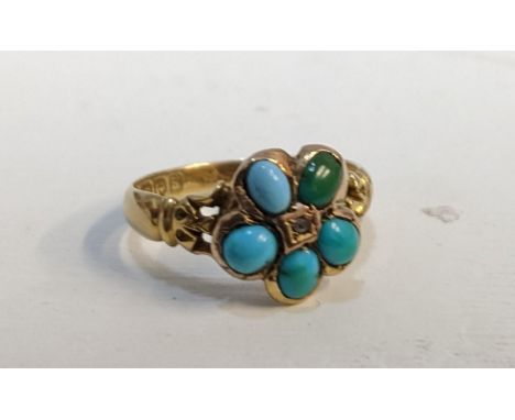 A Victorian 18ct yellow gold, turquoise and diamond chip daisy ring, rose cut diamond chips to the centre surrounded by five 