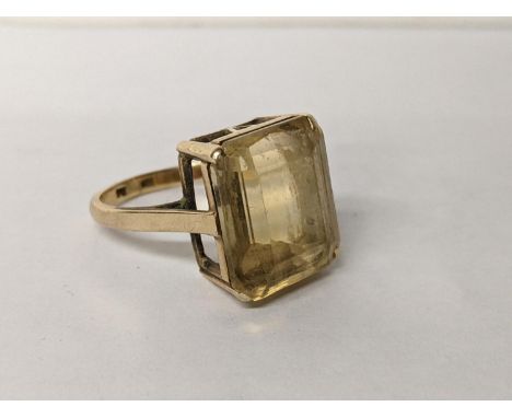 A 9ct gold ring inset with a large citrine 6.5g Location: 