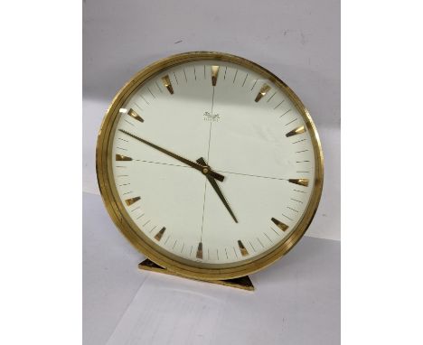A vintage Kienzle electric brass mantel clock 18cm h x 17.5cm w Location: 