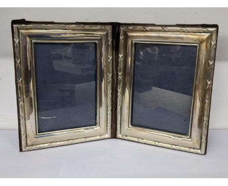 A late 20th century silver folding double photo frame, hallmarked London 1970Location: 