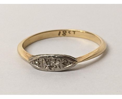 An 18ct gold ladies diamond ring, total weight 2.5gLocation: 