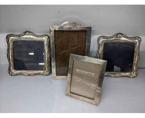 Four silver photograph frames to include a matching pair hallmarked Birmingham 1992, 13cm x 12.5cm Location: 