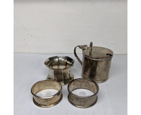 A silver lidded mustard and three silver napkin ring, 110gLocation: 