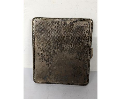An early 20th century silver cigarette case having a gilded interior, hallmarked Chester 1929, 94.5gLocation: 