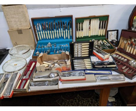 A large selection of silver plate and stainless steel flatware to include boxed and cased sets, a canteen of stainless steel 