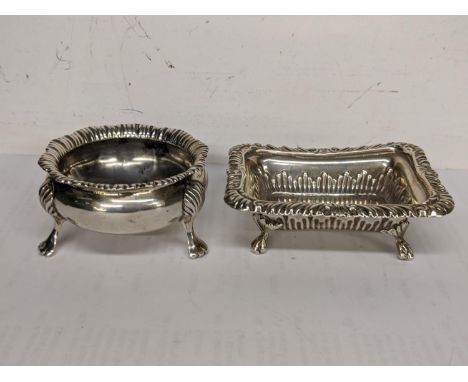 Two early 20th century silver salt pots to include one of rectangular form hallmarked Chester 1903, total weight 74.3g Locati