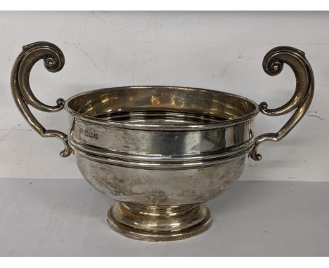 A 1920's silver twin handled bowl, hallmarked Sheffield 1928, 124.5gLocation: 