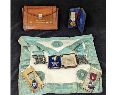 Masonic related items to include silver and silver gilt medals, R.M.I Girls Festival 1917 and others, along with apron and Co