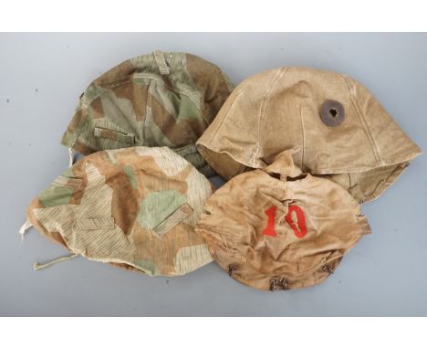 Four reproduction German helmet covers
