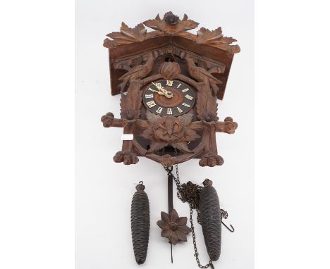 An antique cuckoo clock, 52 cm