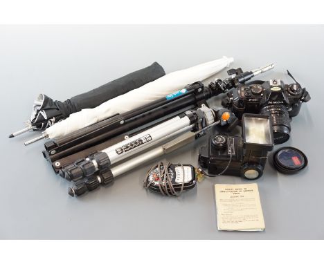A Nikon F-301 camera, Vivitar flashgun, SLIK500G camera tripod, Lastolite tripod etc.