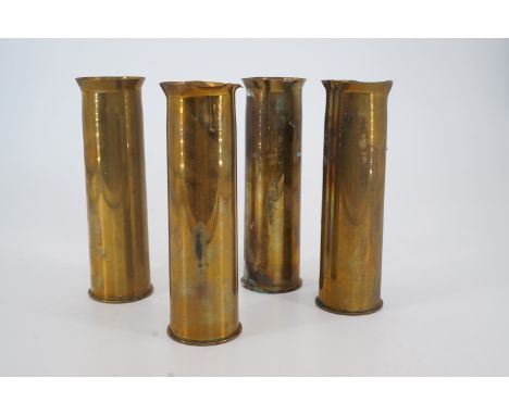 Four trench art vases