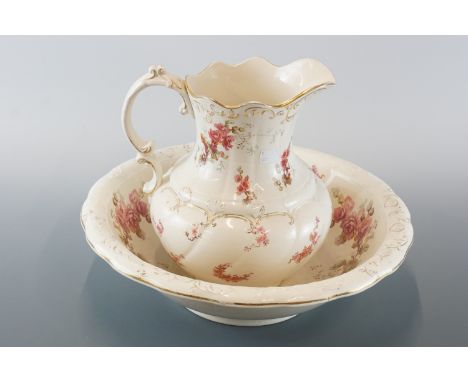 A late 19th / early 20th Century earthenware wash basin and ewer