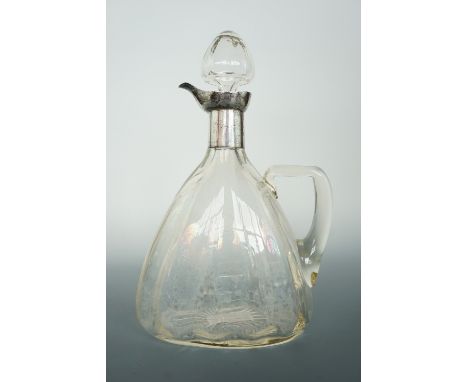 A Belle Epoche Art Nouveau silver-collared glass claret jug, John Grinsell &amp; Sons, 1909, 28 cm