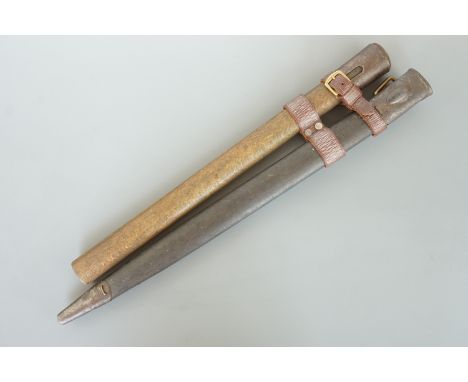 A Pattern 1907 bayonet with entrenching tool helve and strap
