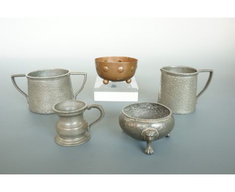 A 1920s Arts and Crafts influenced Craftsman Pewter sugar basin and cream jug, together with a pewter salt, baluster measure 