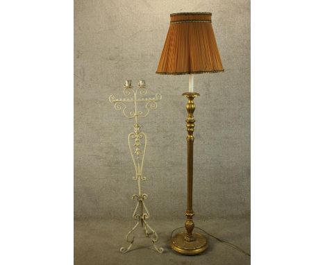 a wrought iron floor lamp set with two iron candle holder along with a vintage carved gilt lamp standard and shade. H.197cm. 