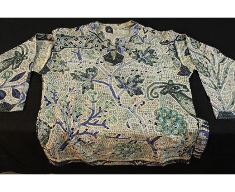 A Hermes silk tunic and belt, featuring a mosaic print with animals in shades of blue, green and yellow. It has a v-neck coll