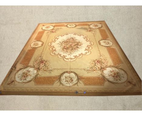 An Aubusson tapestry style carpet. L.307 W.235cm. 