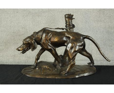 After R J Mene, a large spelter figure group of a hunting dog tied to a post. Signed to base. H.43 W.70cm. 