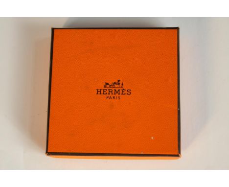 A boxed Hermes gold plated Chaine d'Ancre scarf ring, stamped Hermes. L.7.5 W.7.5cm. (box) 