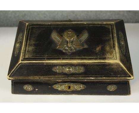 An ebonised and brass box filled with a collection of jewellery including an agate bangle and jade ring. H.10 W.20cm. 