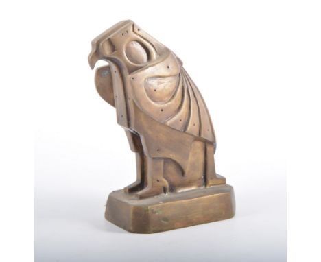 A cast bronze sculpture of a stylised eagle, on shaped plinth, 21.5cm high.