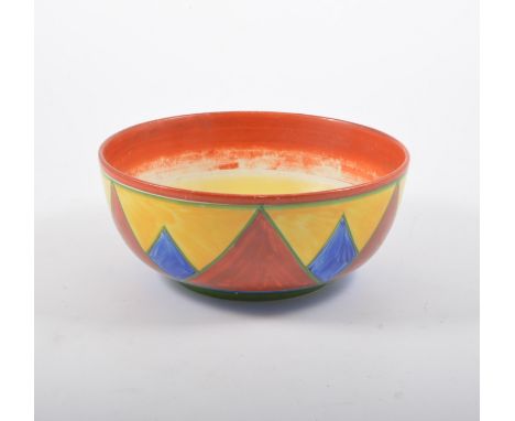 A Clarice Cliff "Bizarre" hand painted bowl, red, blue and yellow zig-zag design, 19.5cm diameter with a Wilkinson Ltd green 