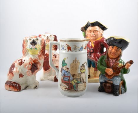 Pair of Staffordshire dogs, with baskets of flowers, 22cm; two other pairs of Staffordshire dogs; Jackfield type model of a c
