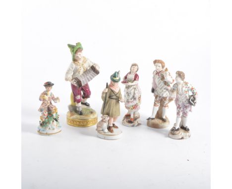 German porcelain figure of a waif playing an accordion, 15cm and five other small German figurines (6).