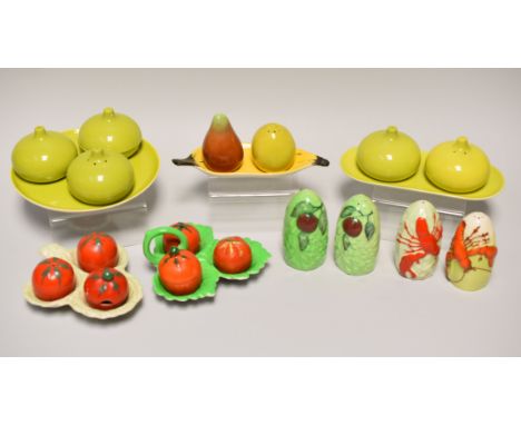 A PARCEL OF NOVELTY CARLTONWARE CRUETS including two three piece tomato cruets, fruit trio with banana stand etc