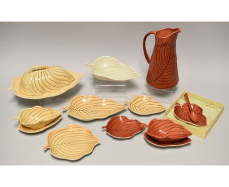 A PARCEL OF CARLTONWARE 'PIN-STRIPE' in three colours and including jug, butter dish, a dish in original box, other dishes et