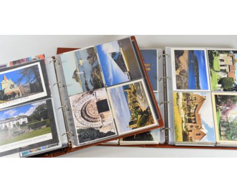 FIVE COMPREHENSIVELY FILLED ROYAL MAIL POSTCARD ALBUMS containing hundreds of colour and vintage mixed postcards