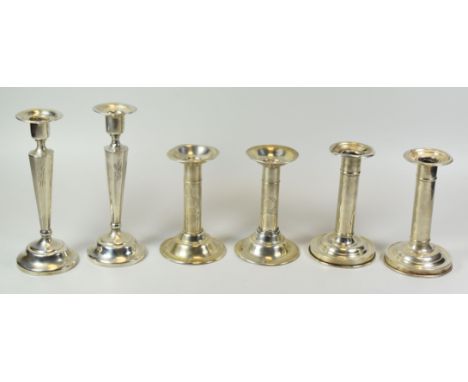 THREE PAIRS OF AMERICAN SILVER CANDLESTICK HOLDERS comprising a pair of plain circular footed column examples, a pair of mono