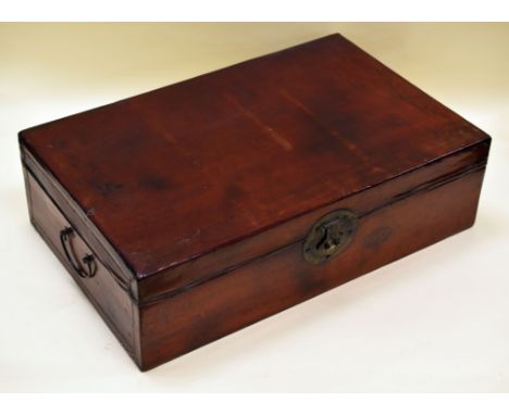 A CHINESE TRUNK IN PIG-SKIN LEATHER with two handles and printed interior, 76cms wide