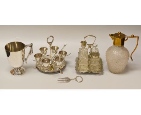AN EPNS PARCEL OF EGG CADDY, CRUET SET & CUP together with a crackle glazed glass decanter and a toasting-fork