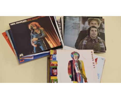 A QUANTITY OF VINYL RECORD ALBUMS by mainly popular late twentieth century artists including Michael Jackson, The Beach Boys,