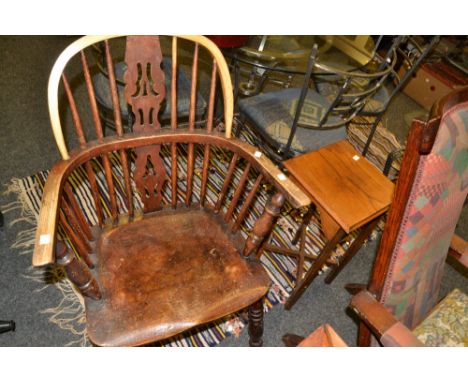 A 19th century Windsor chair, crinoline stretcher, c.1860;  an Arts and Crafts style oak lamp table (2)