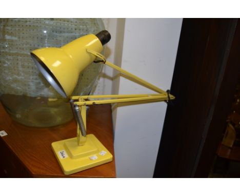 A vintage angle poise desk lamp, cast marks