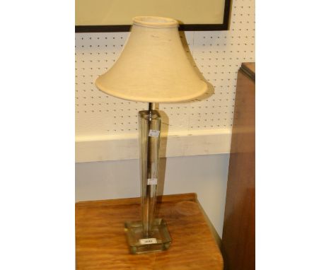 A stylised tapered glass table lamp, shaped base; another similar