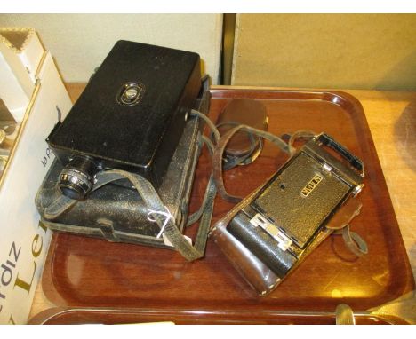 Kodak Model BB Junior Cine Camera, Kodak Folding Camera and a Weston Master II Light Meter 