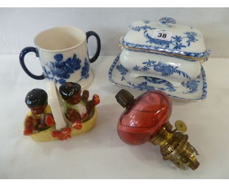 Novelty children salt and pepper cruet, Doulton blue and white loving cup, tureen on stand, cranberry glass peg lamp