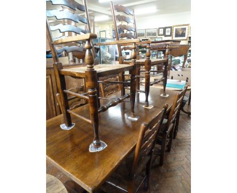 Titchmarsh & Goodwin oak refectory dining table and 6 rush seat ladder back chairs 