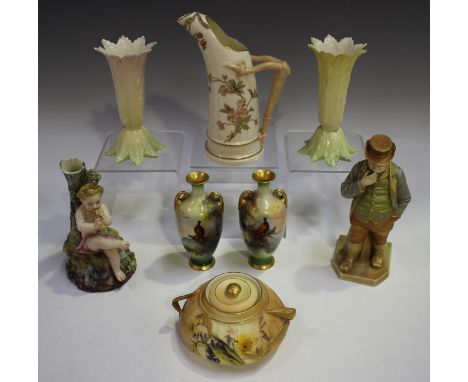 A small group of Worcester porcelain, late 19th and early 20th century, comprising a pair of two-handled vases, decorated wit