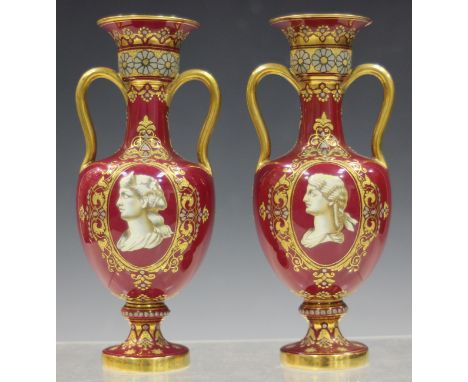 A pair of Coalport pâte-sur-pâte two-handled vases, late 19th century, each with a classical bust portrait turned to dexter, 